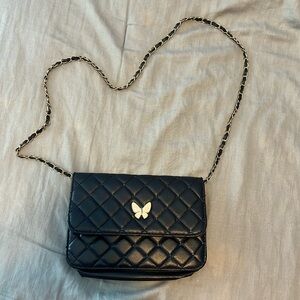 Black crossbody bag with butterfly detail